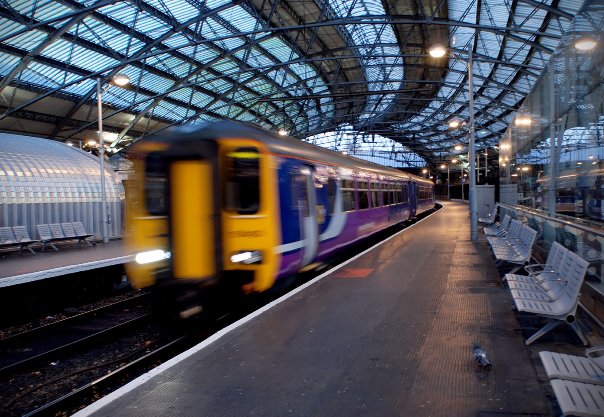 Train passing through station in Liverpool