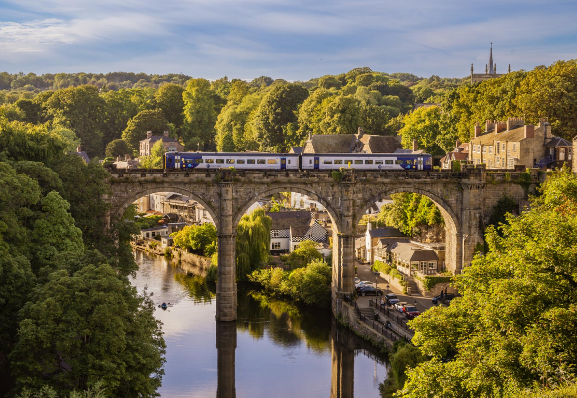 Train passing over bridge in Knaresborough, North Yorkshire