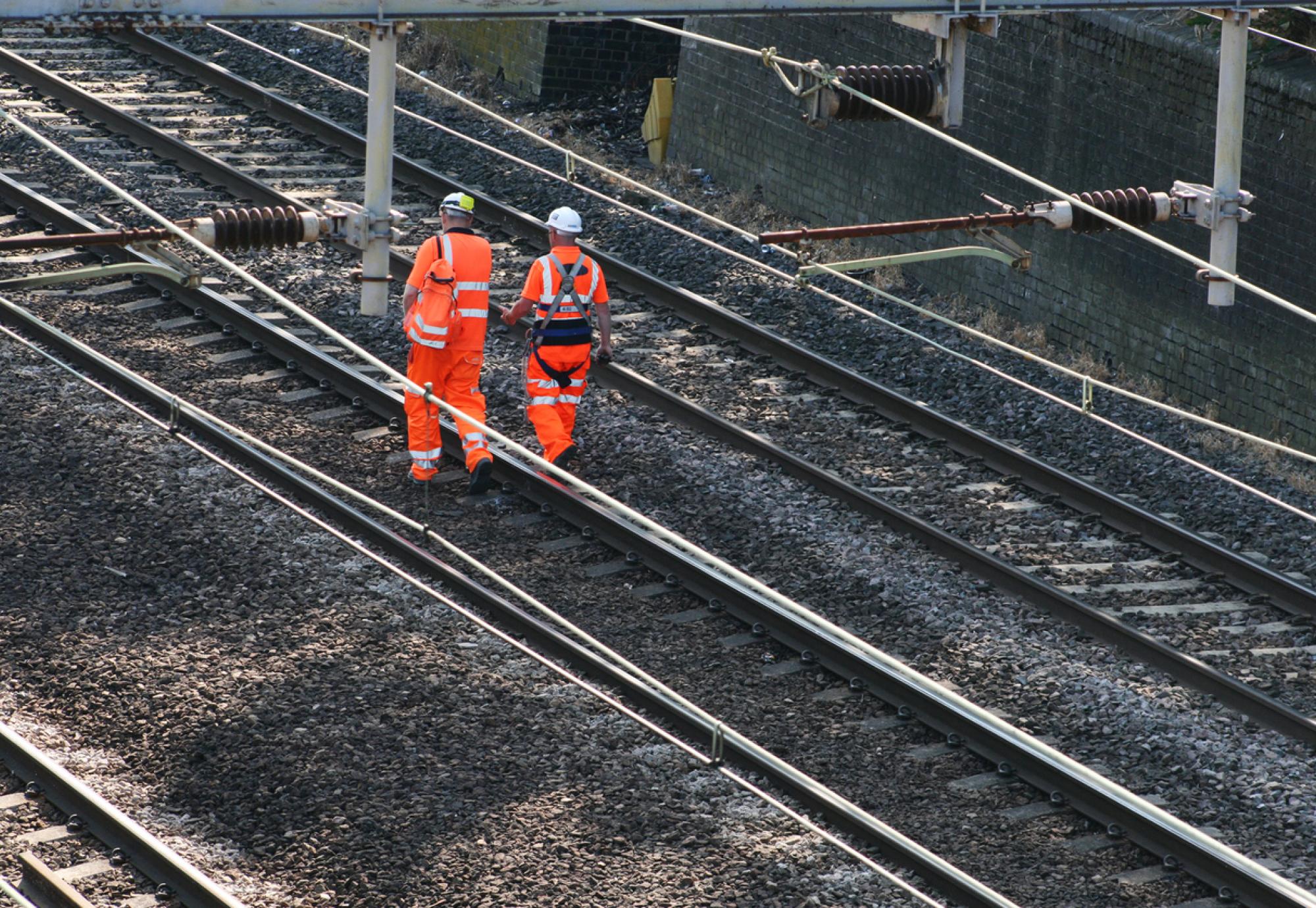 Men walking on a track