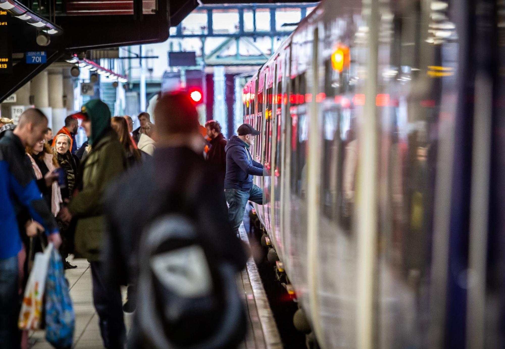 Passengers boarding a Northern Train