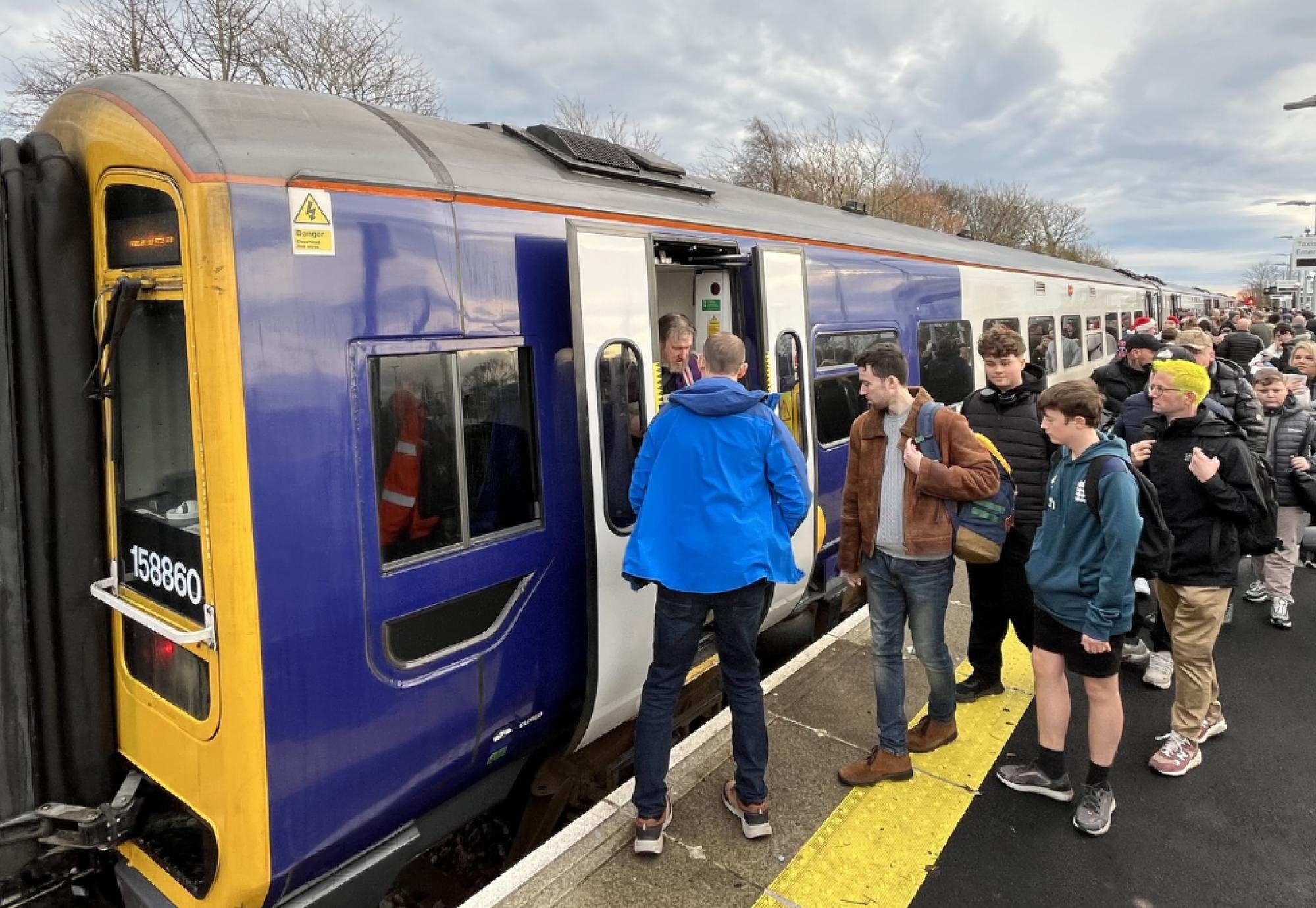 Passengers boarding a train in Northumberland