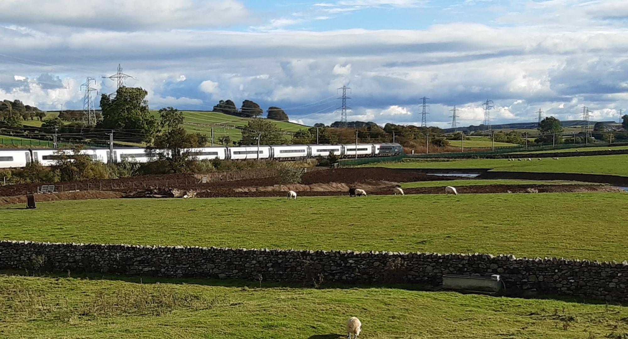 Restored River Leith beside West Coast main line in Thrimby