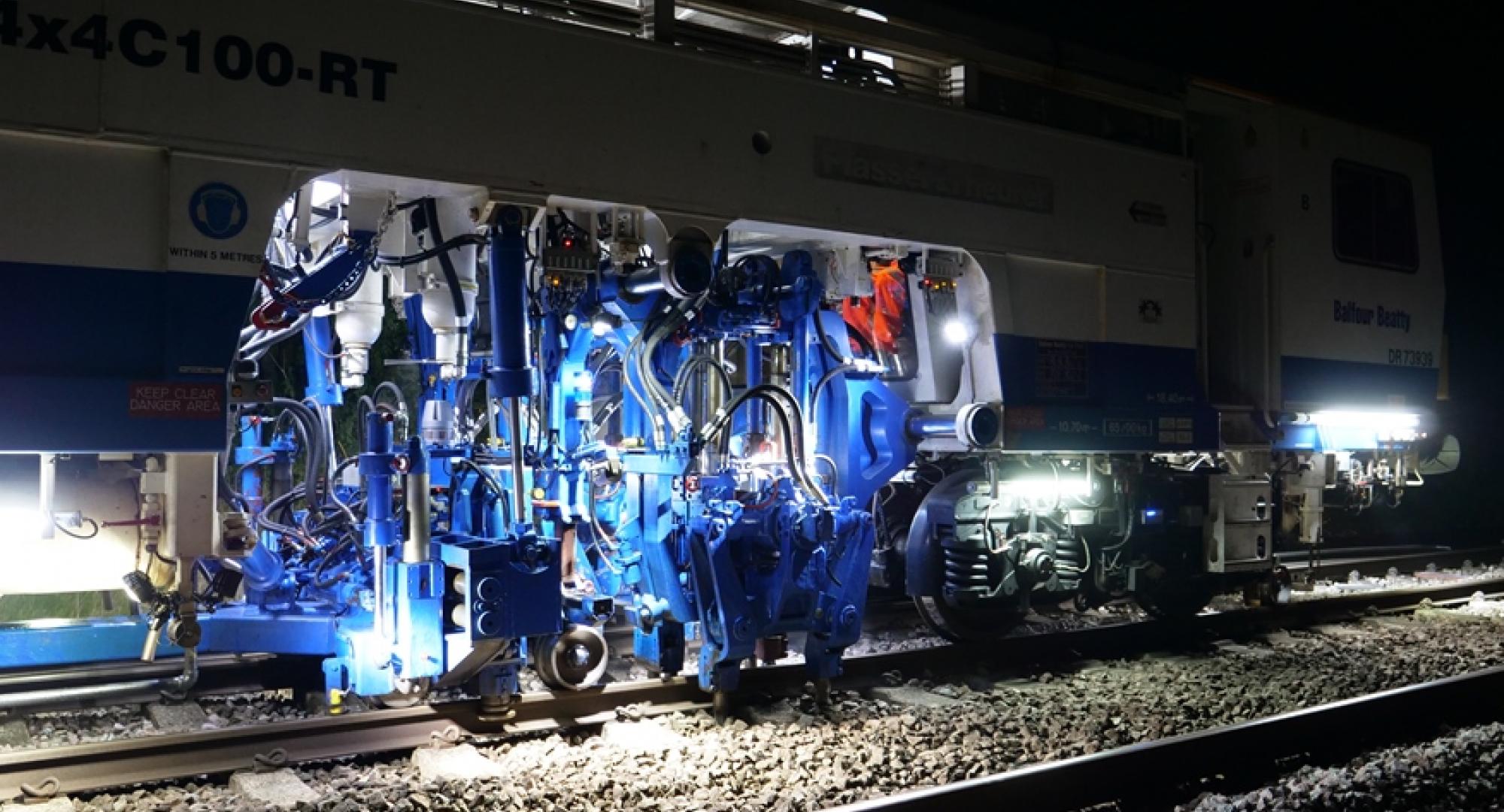 Network Rail's tamping machines in action in Kent