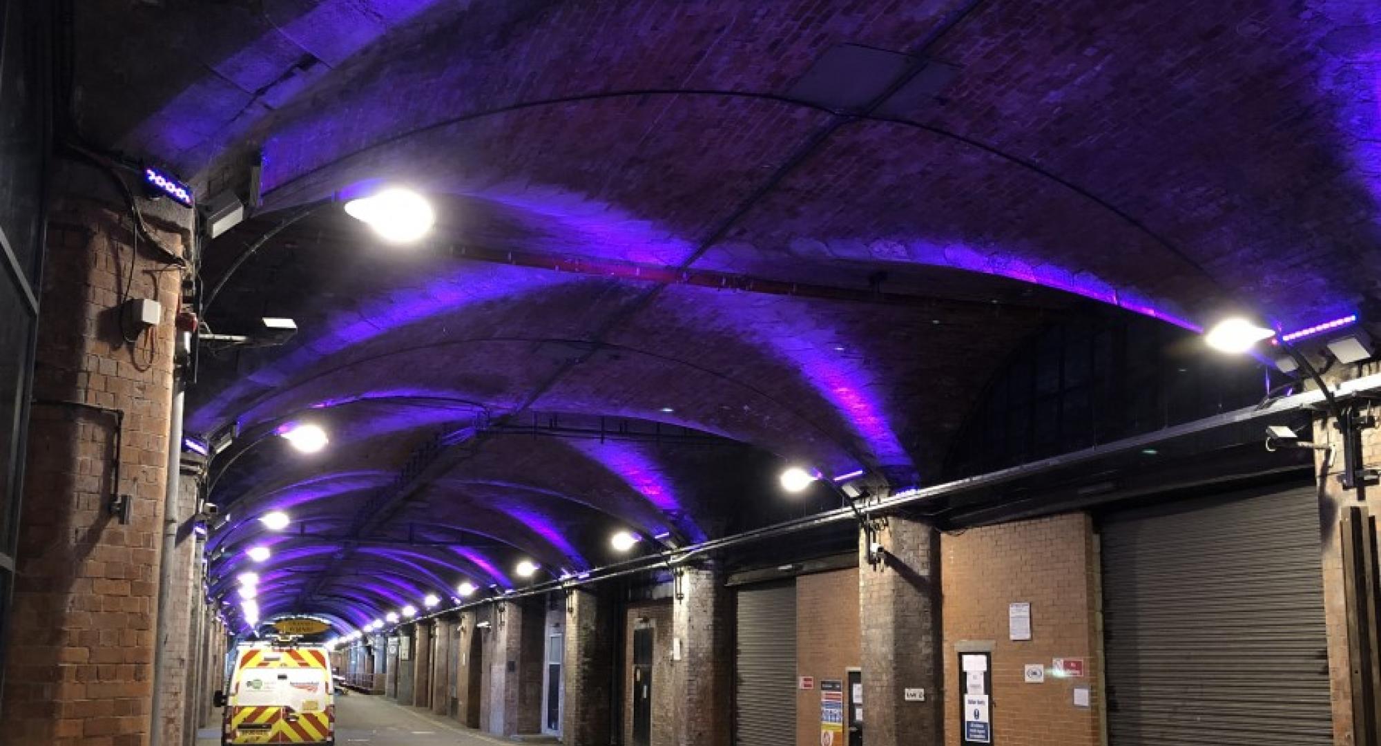 Station with purple lights on the wall 