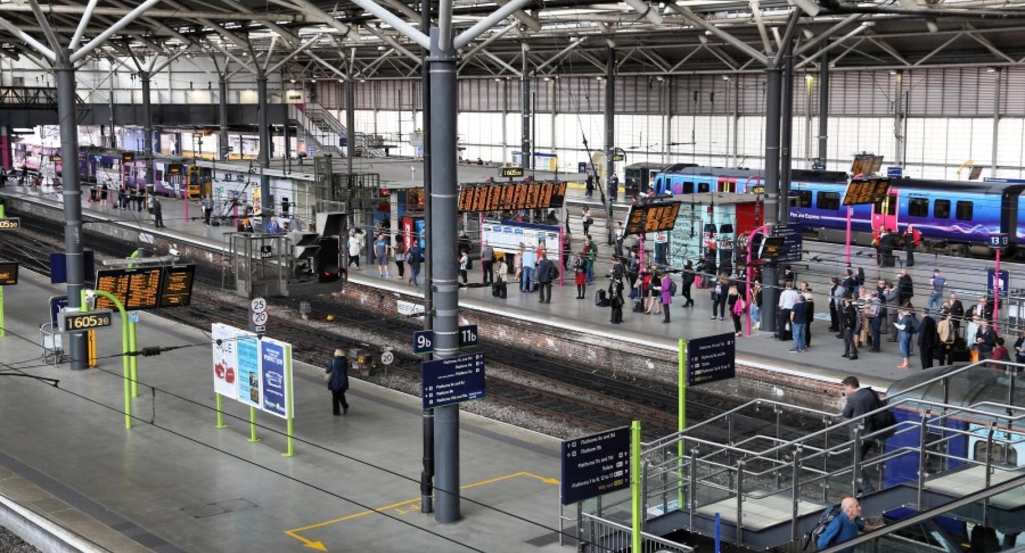 Passengers wait at Leeds Station in the UK