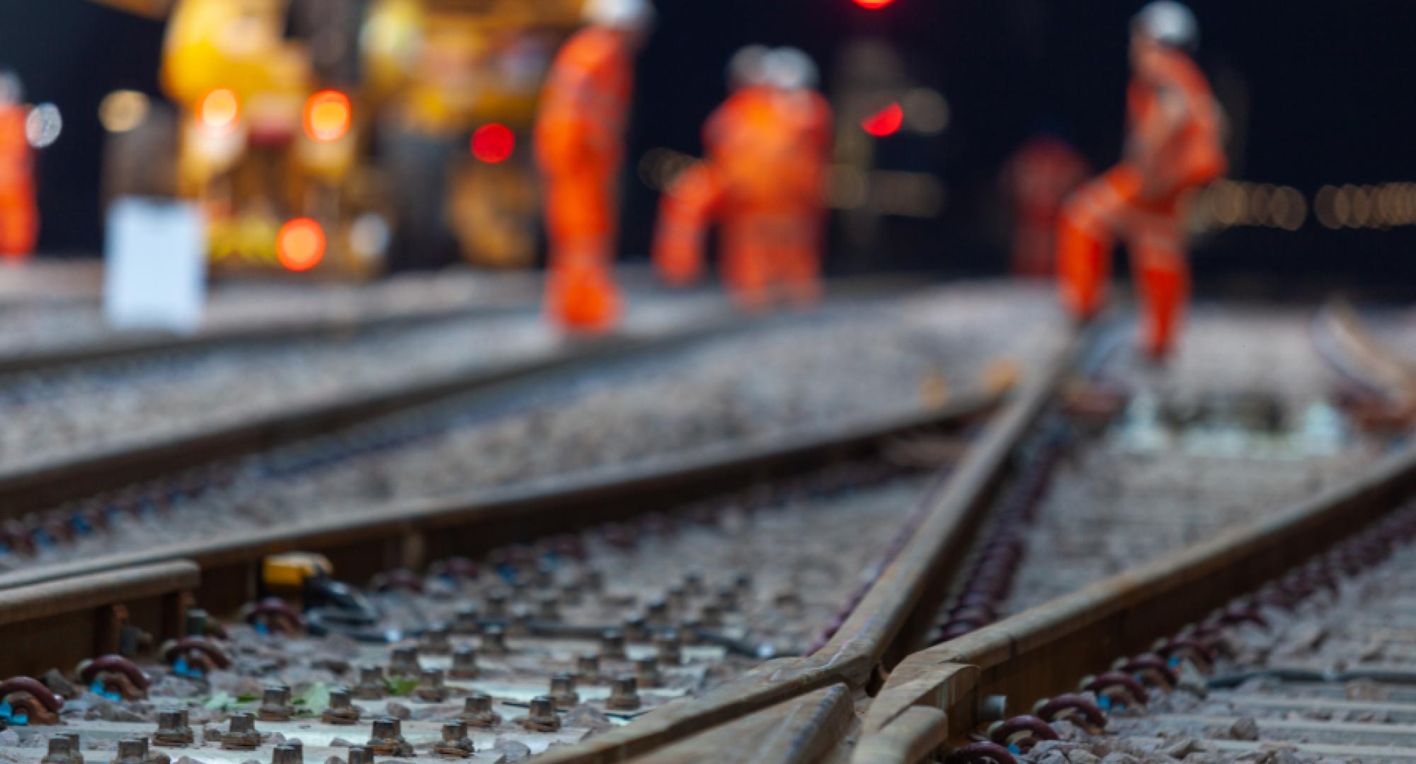 workers on railway track 