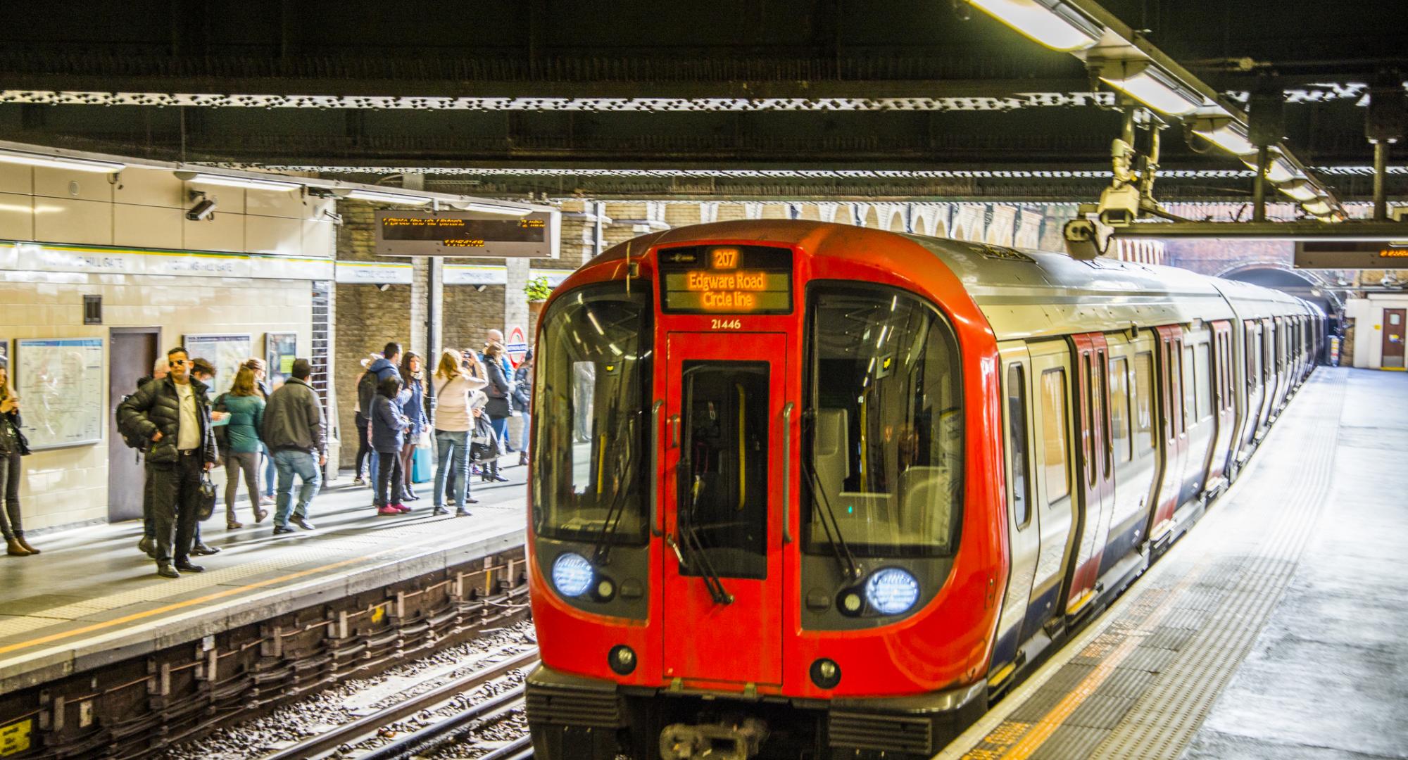 London Underground train arriving at a station