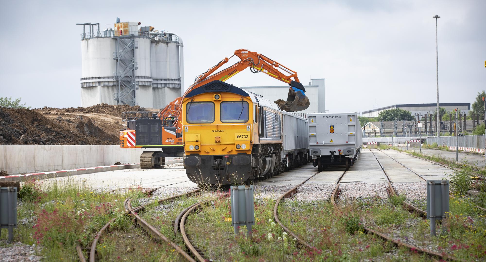 Freight train leaving HS2 Logistics Hub in Willesden