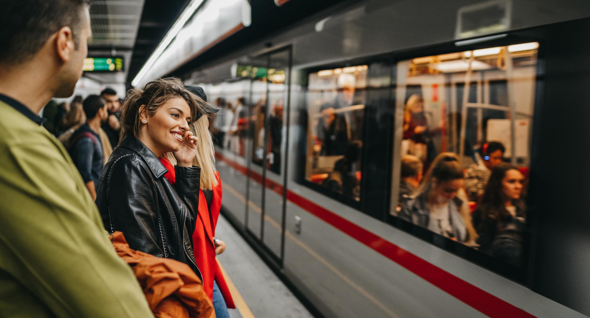 Passengers on a train station platform