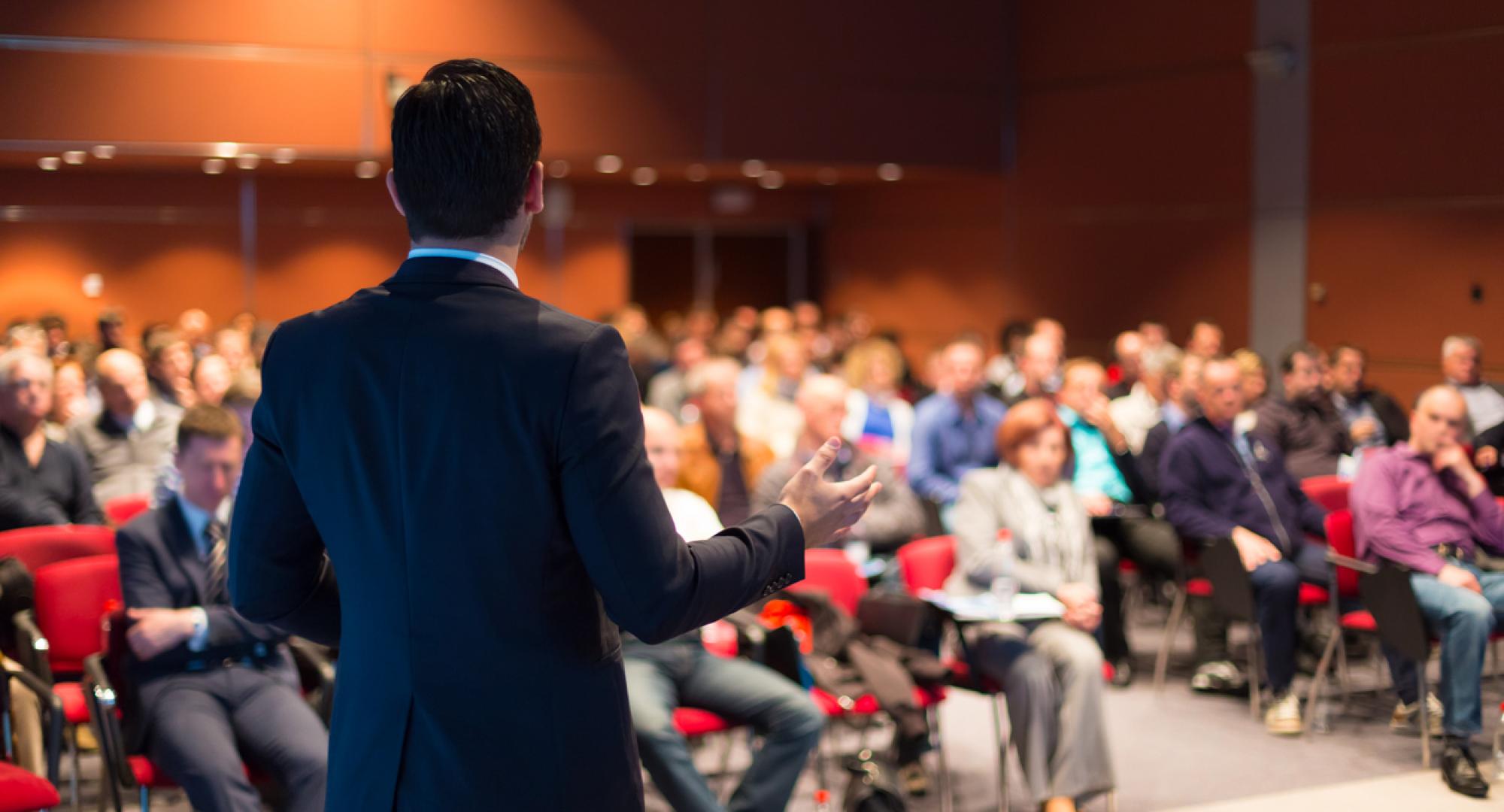 People attend business conference