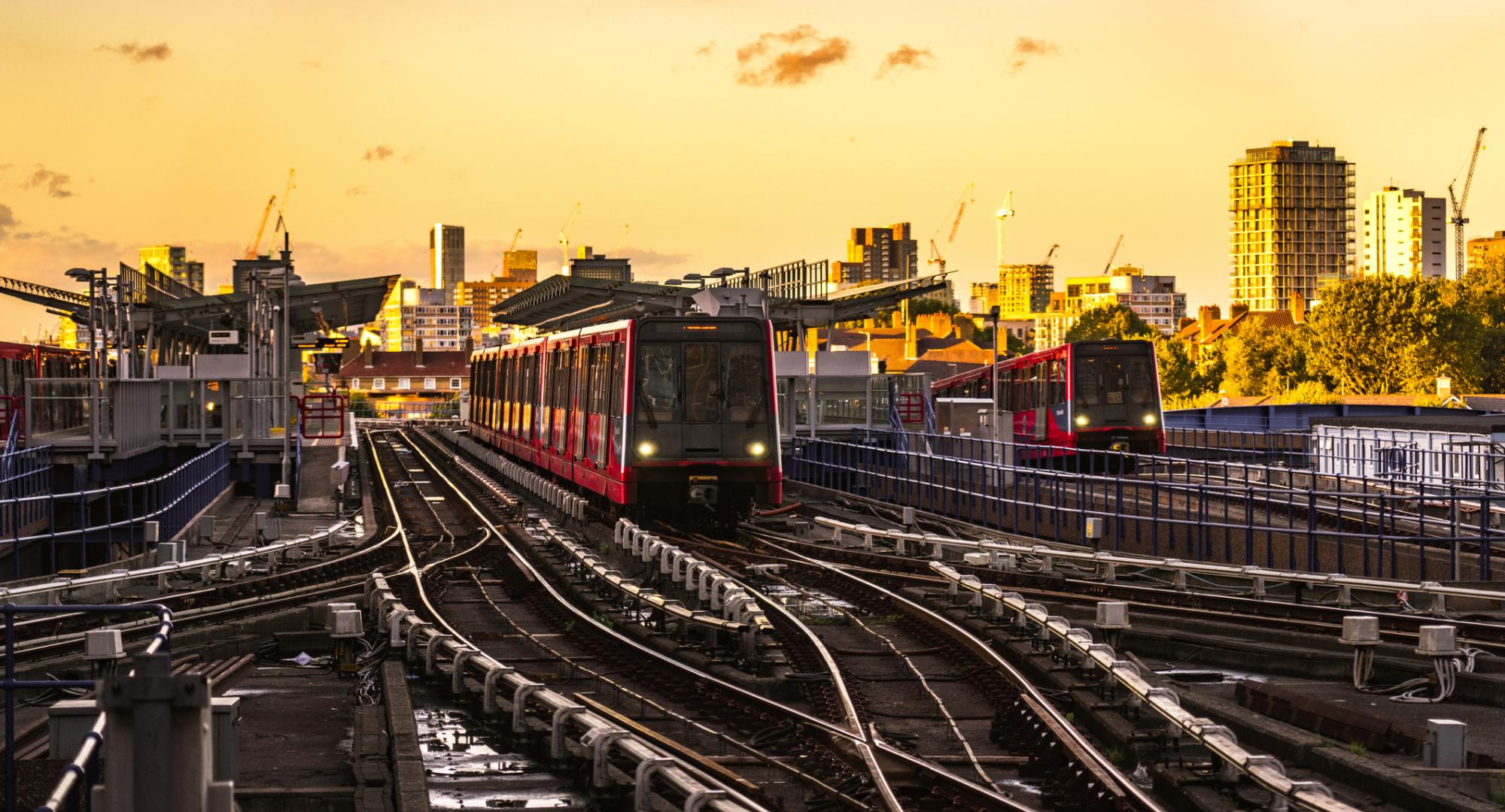 Docklands Light Railway (DLR) trains at sunset