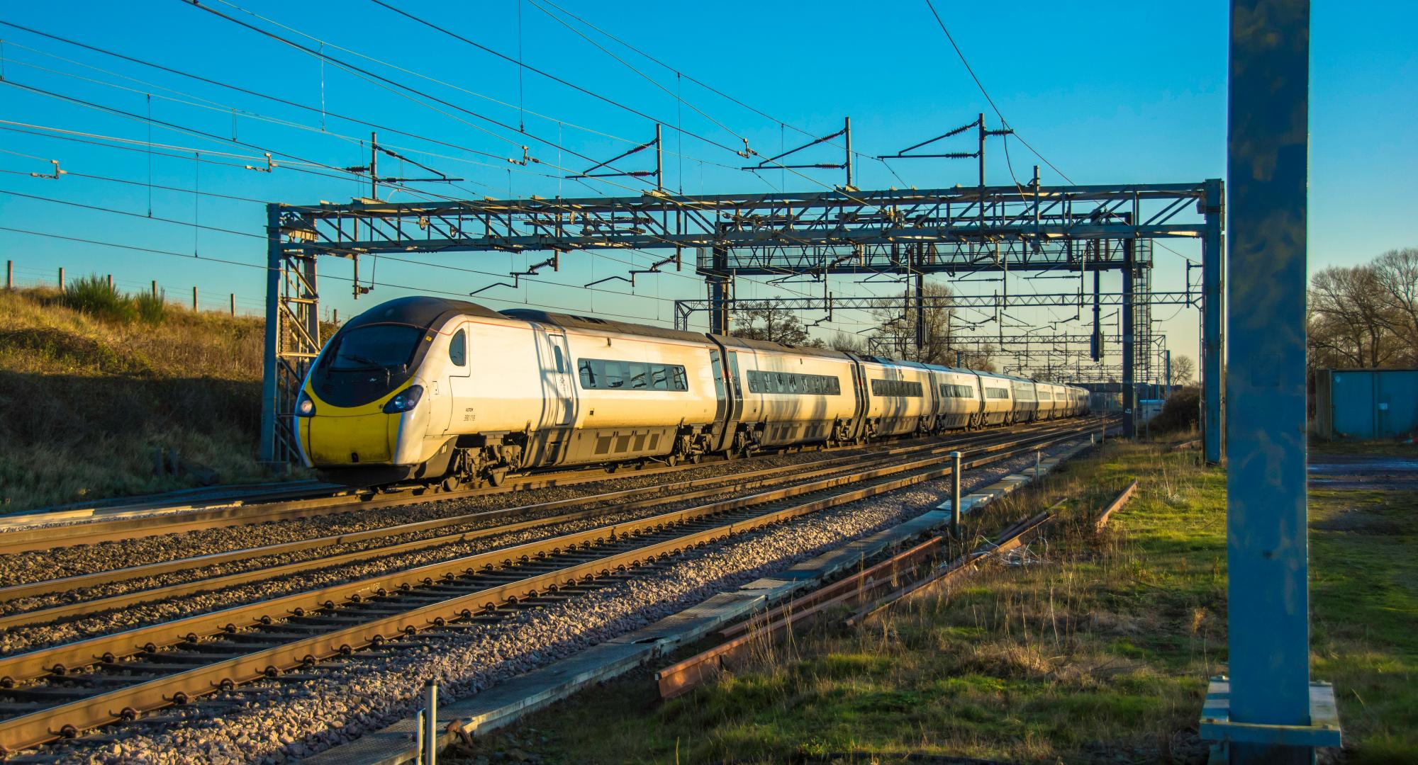 Train travels down tracks