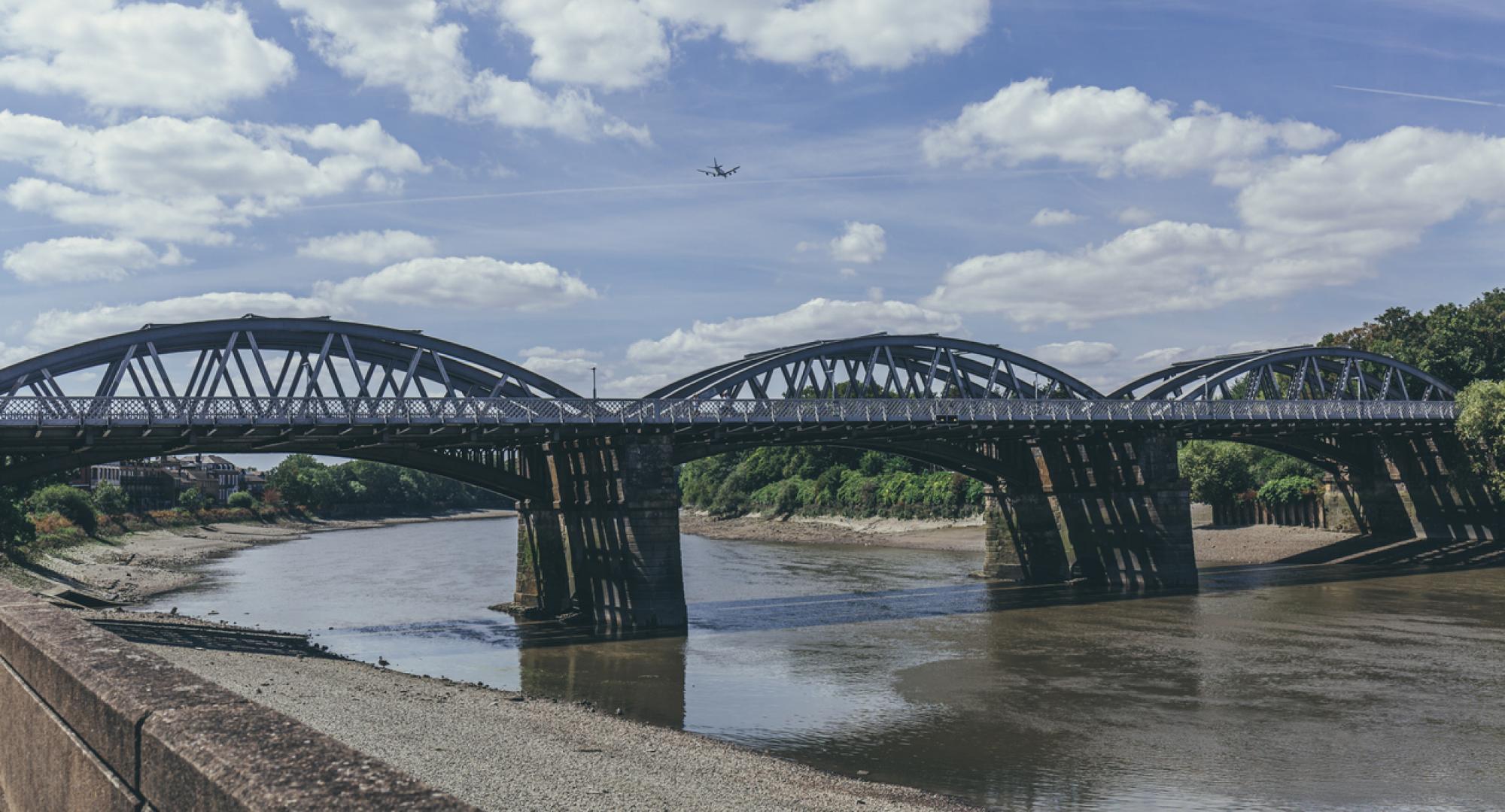 Barnes Railway Bridge located in the London Borough of Richmond upon Thames and the London Borough of Hounslow, via Istock 