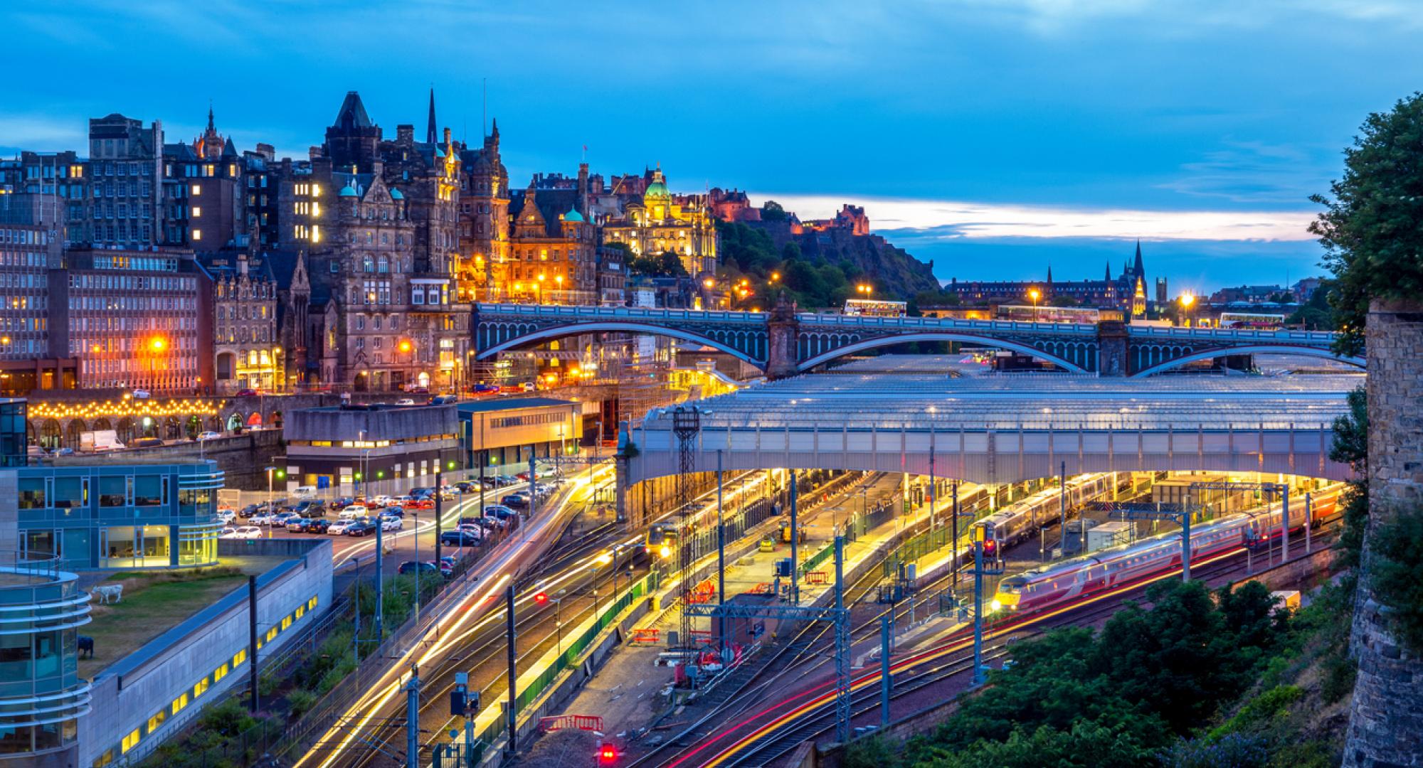 Night view of waverley station in edinburgh, scotland, via Istock 