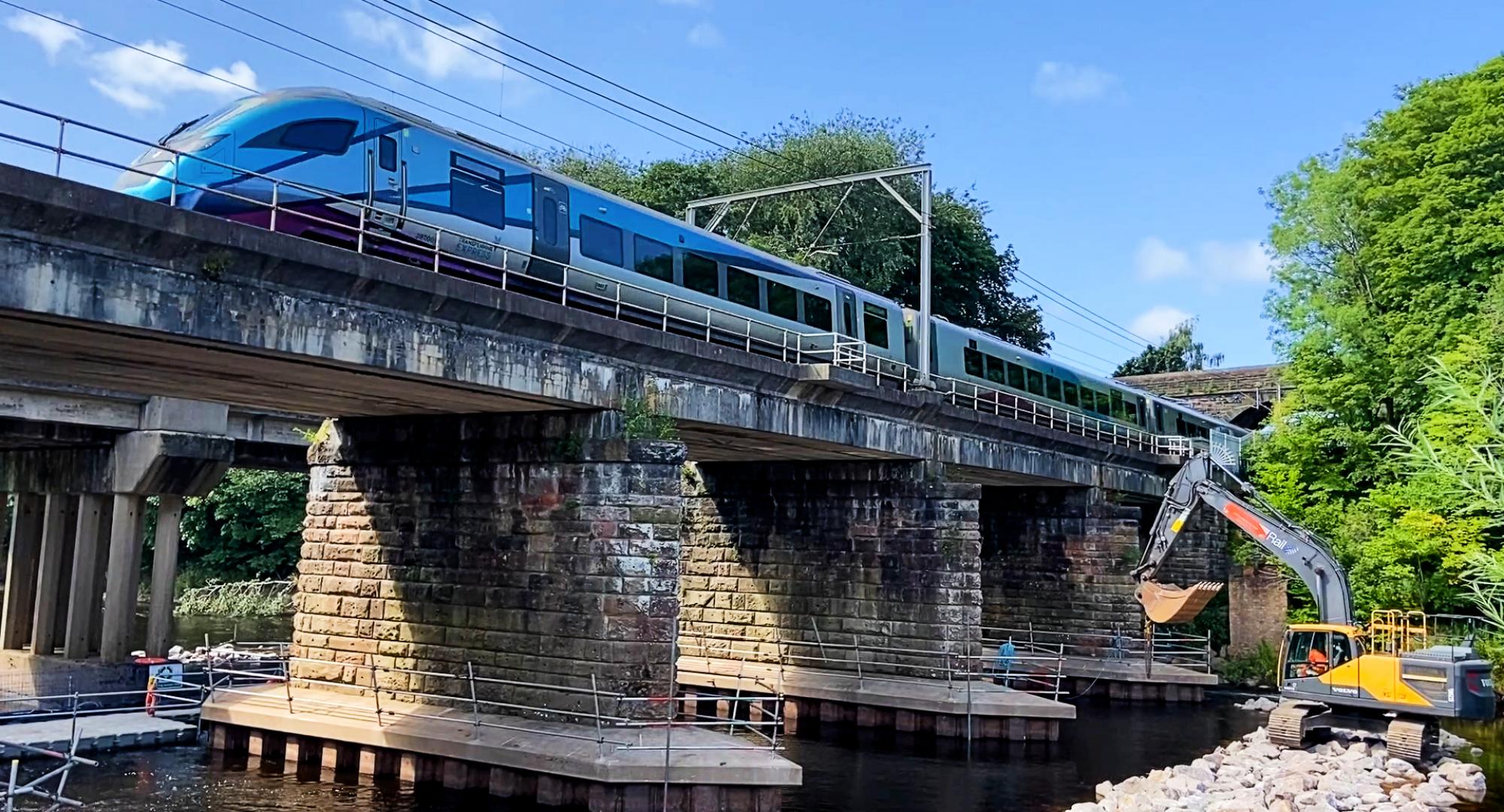 Eden viaduct with Transpennine Express passing over the top, via Network Rail 