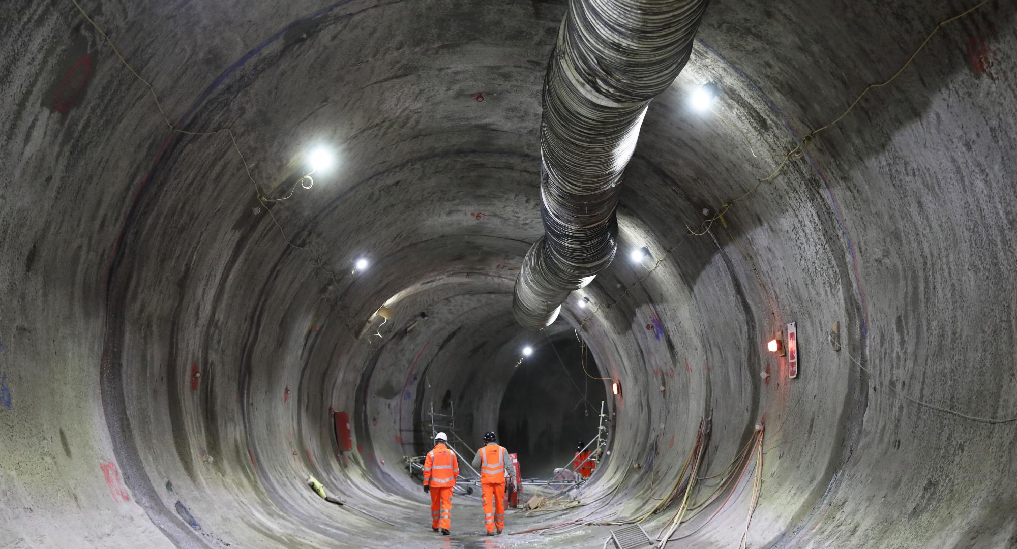 Engineers walking through the traction substation tunnel beneath HS2's Euston Station, via HS2 