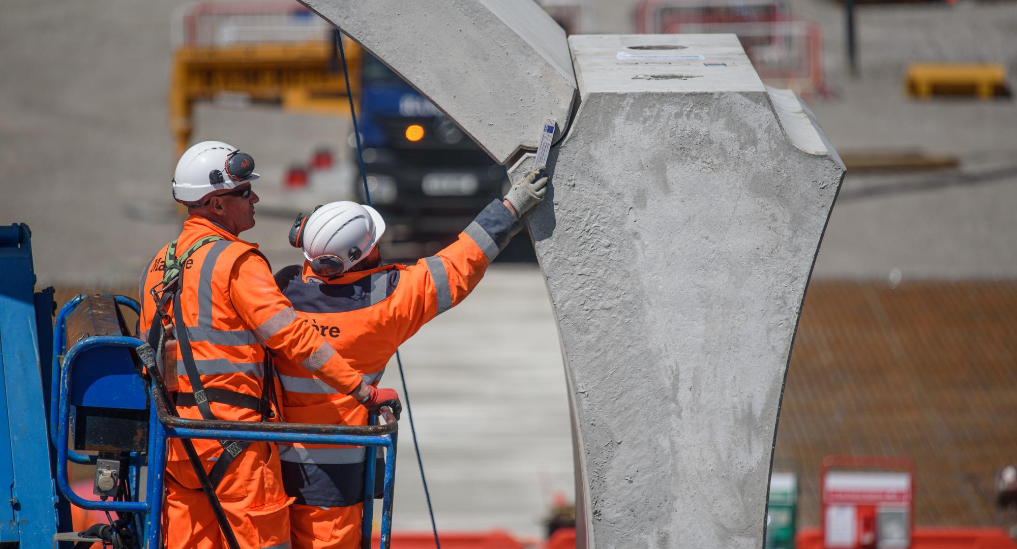 Workers inspect part of HS2