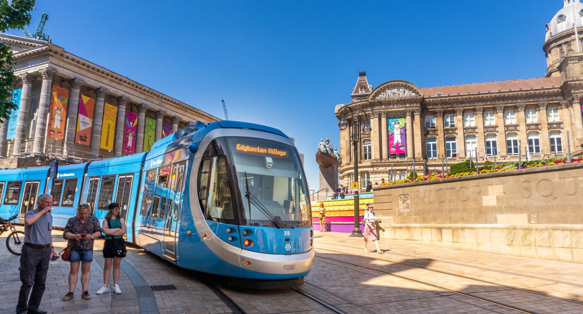 Image of Birmingham tram with City Hall in the background