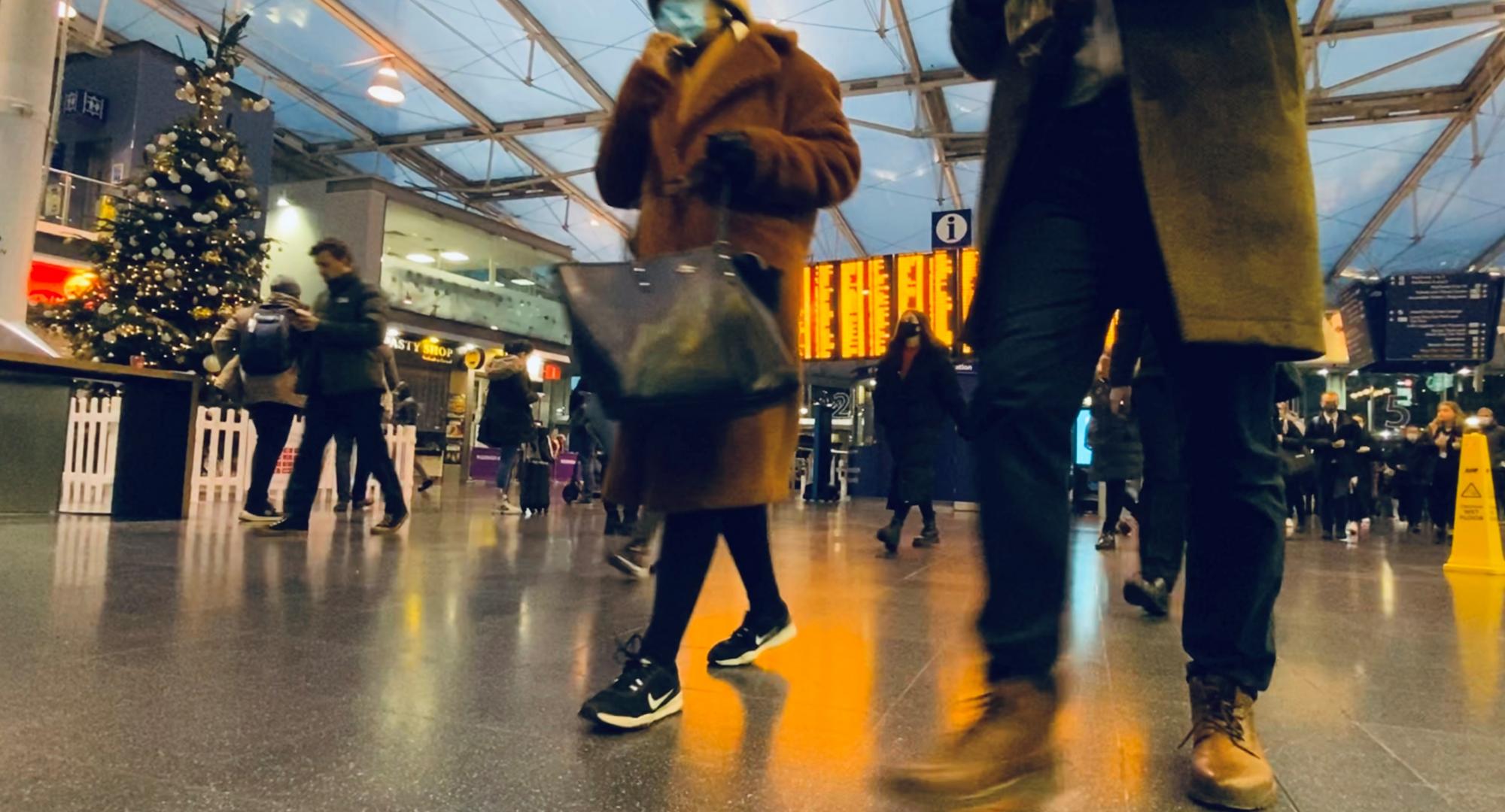 Passengers in a Railway Station