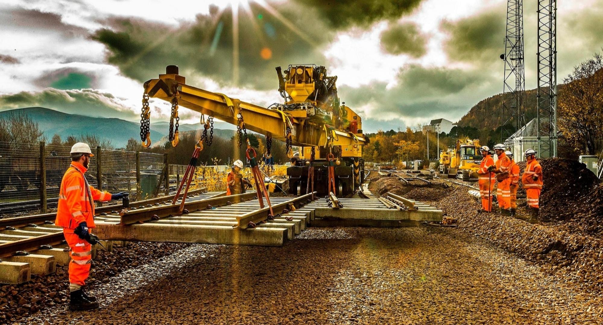 Engineers Replacing Track