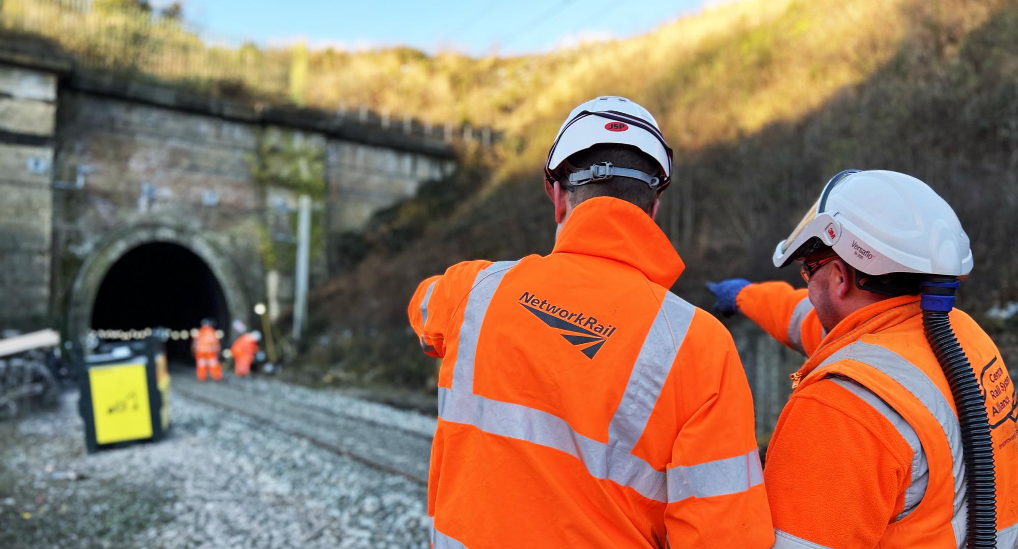 Engineers looking at tunnel