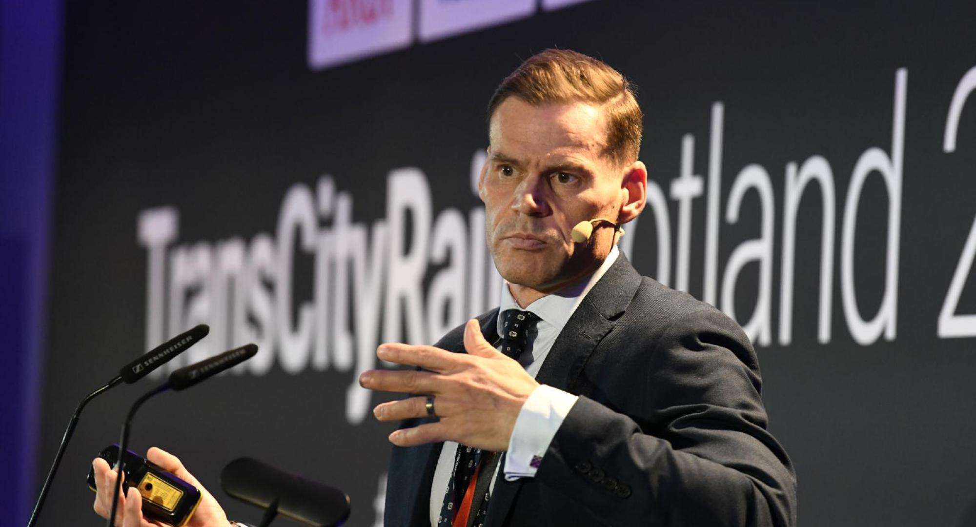 Ross Moran speaking at TransCityRail Scotland 2025