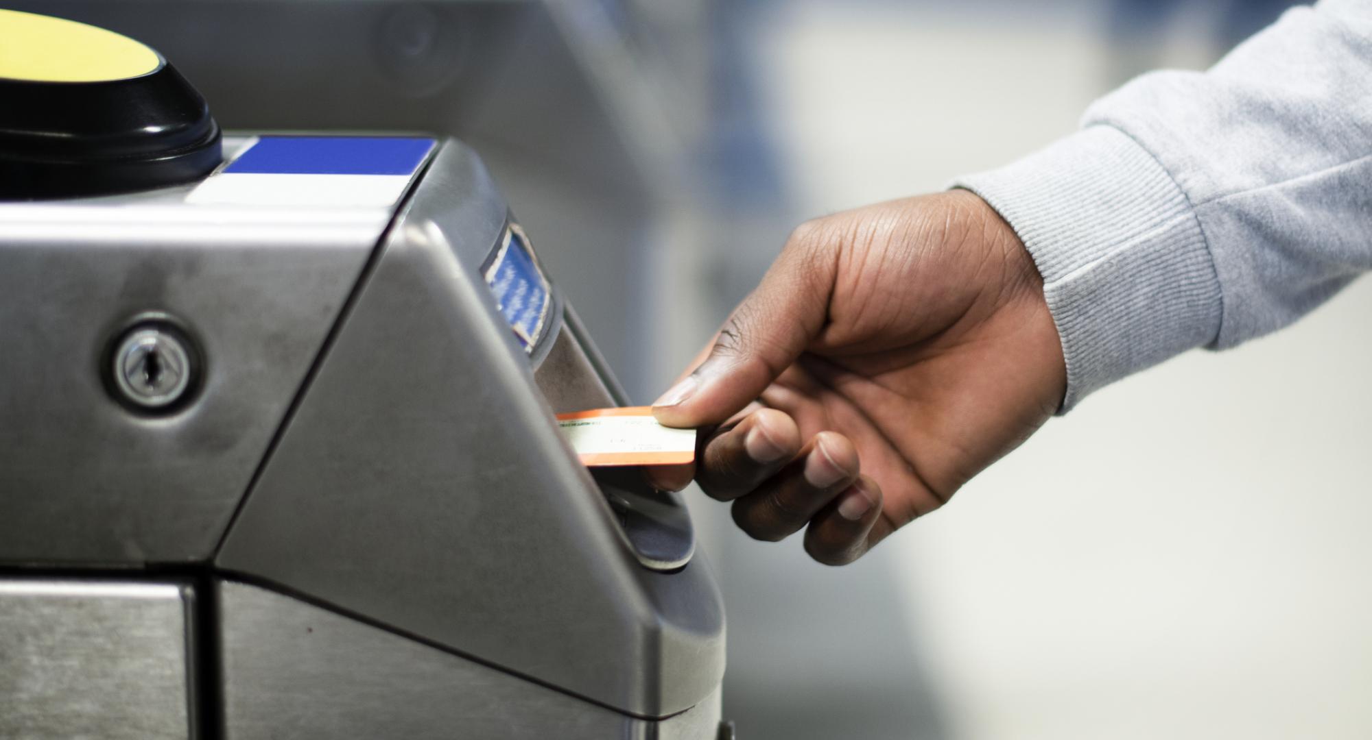 Man using train ticket