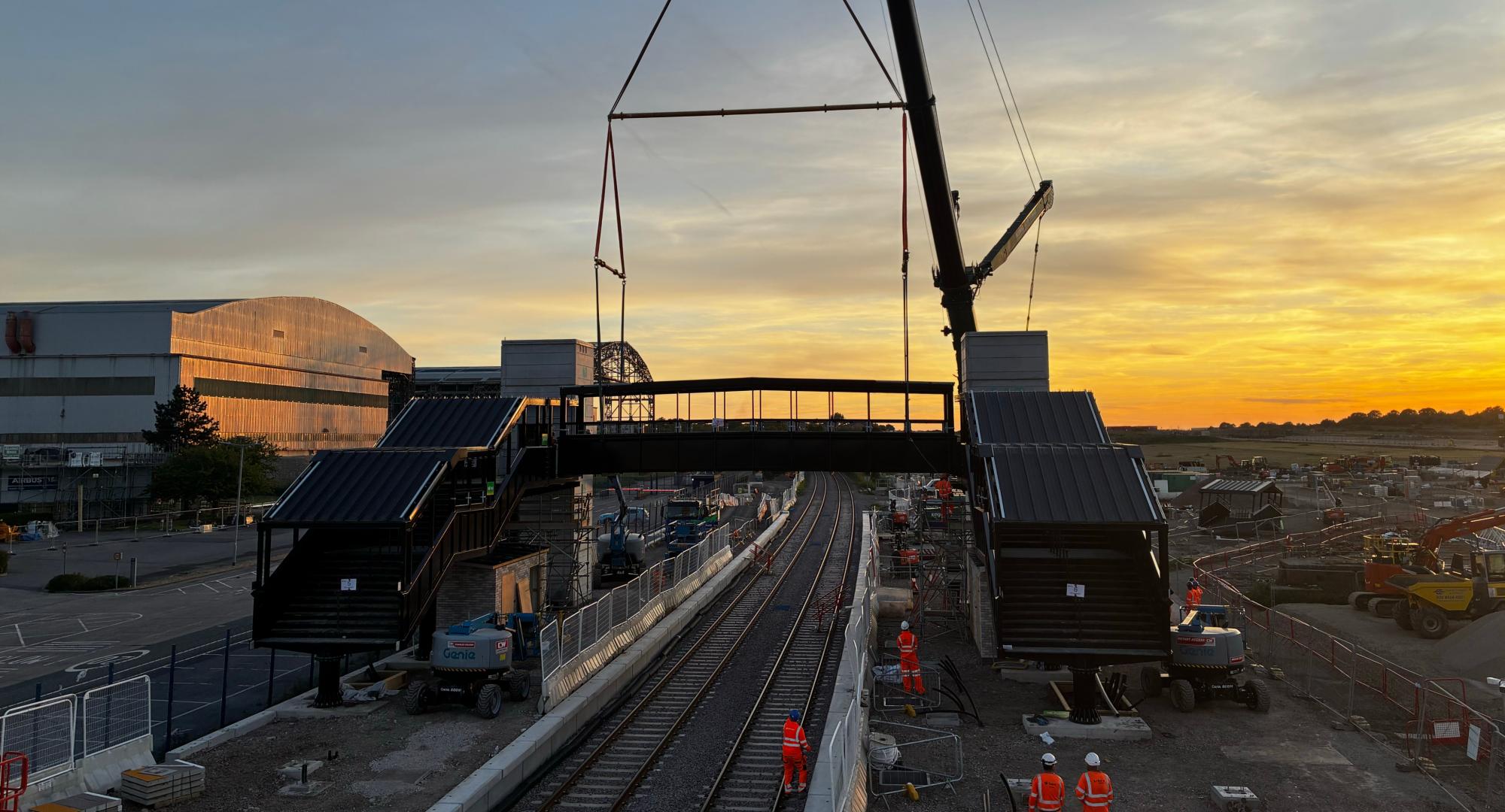 Lifting the footbridge into place