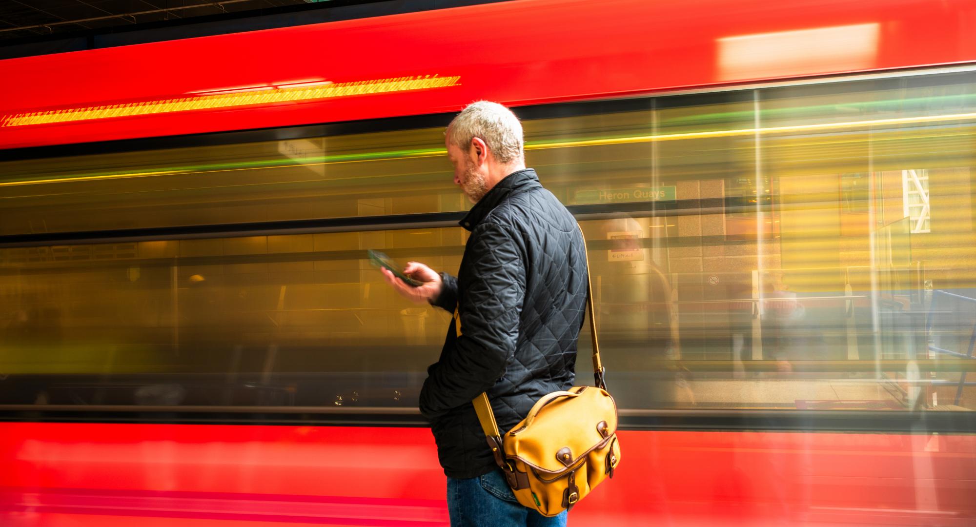 Man near a fast train