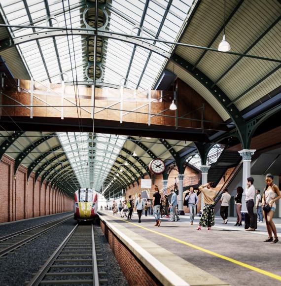 CGI image looking length of Platform 1 with clear view of new footbridge at Darlington station