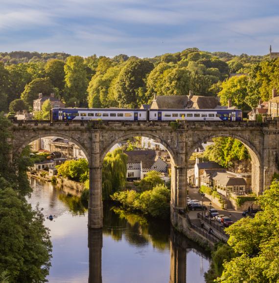 Train passing over bridge in Knaresborough, North Yorkshire