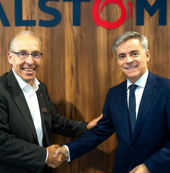 Leaders at LMO and Alstom shake hands