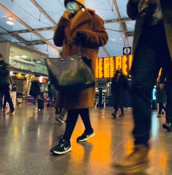 Passengers in a Railway Station