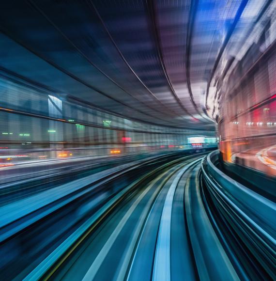 Fast train going through a station.