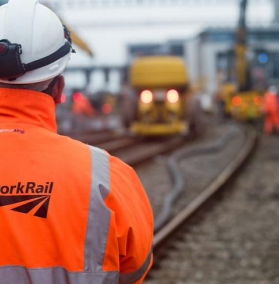 Network Rail Worker On Track